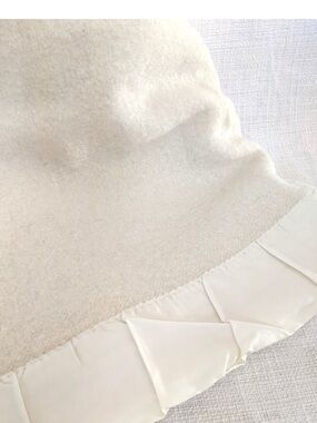 VTG Baby blanket by  Chatum all wool satin trim  in Ecru Satin trim ..